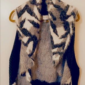 Mock fur leopard print vest